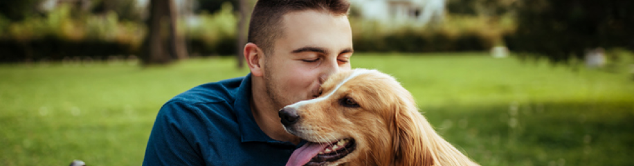 Photo of man and dog